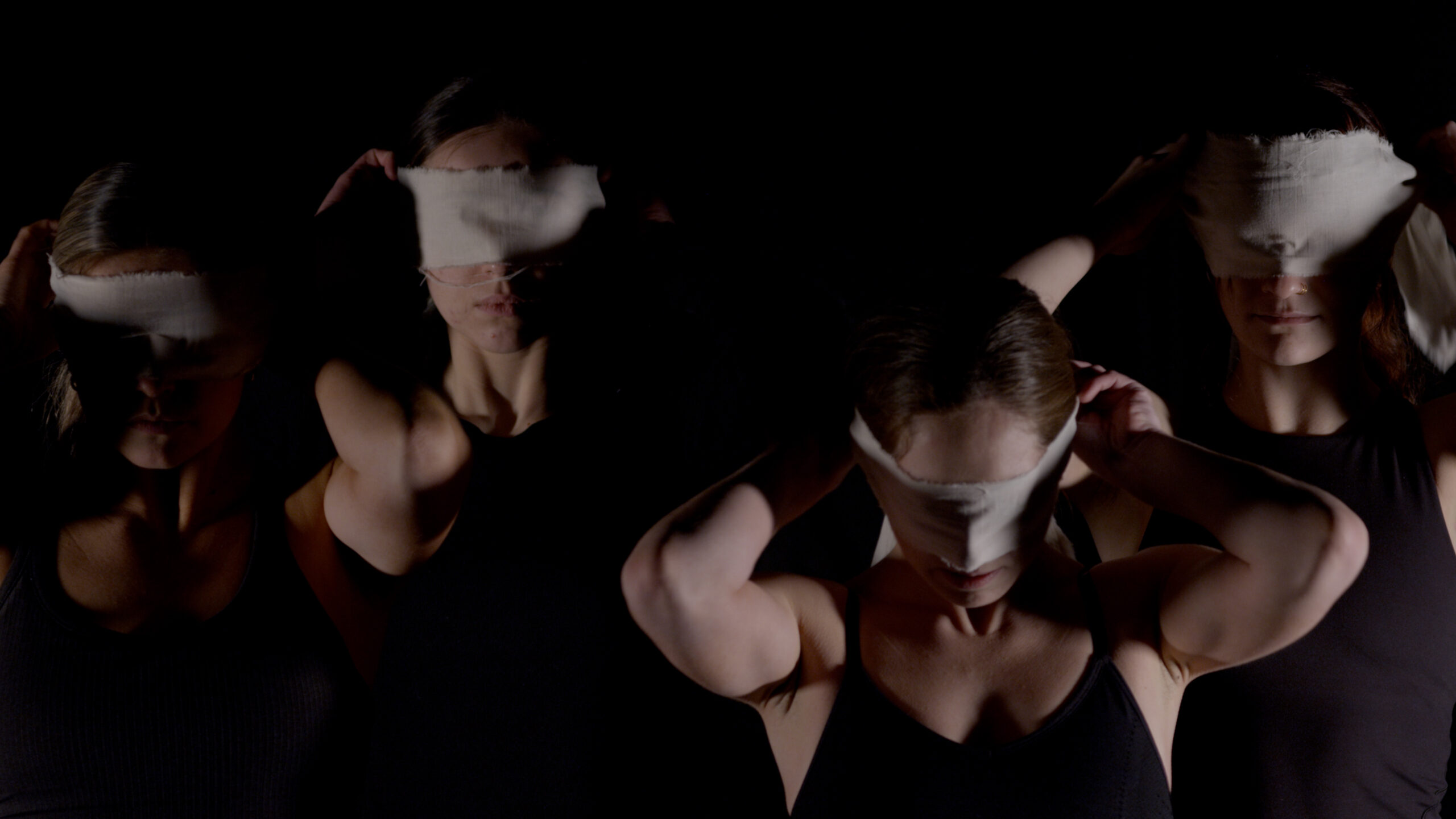 Four blindfolded dancers